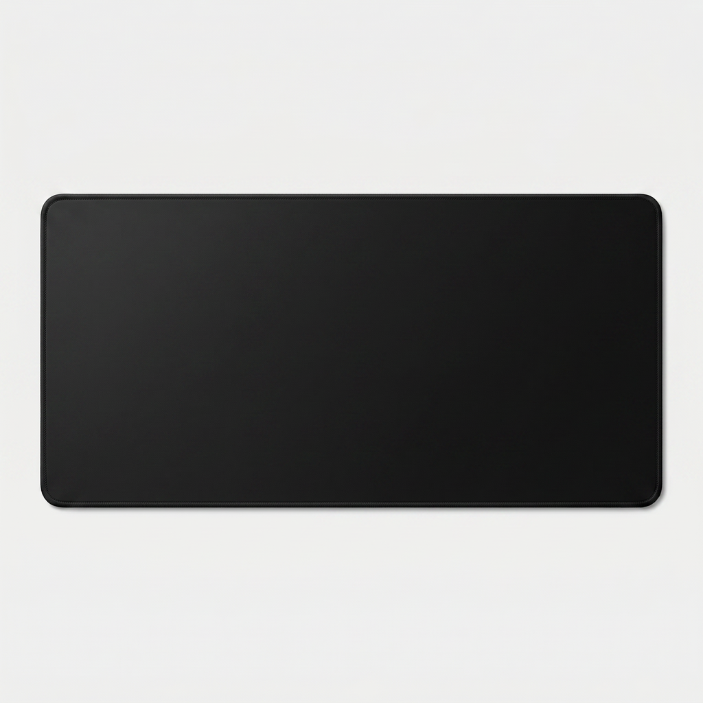 Extended XL desk mat in black with stitched edges on grey studio background