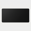 Extended XL desk mat in black with stitched edges on grey studio background