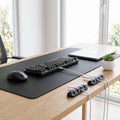 Desk mat and cable clip organiser bundle on desk