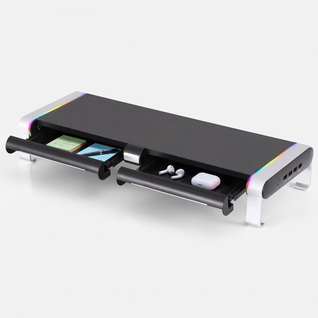 Black monitor stand with USB hub and RGB lighting on desk
