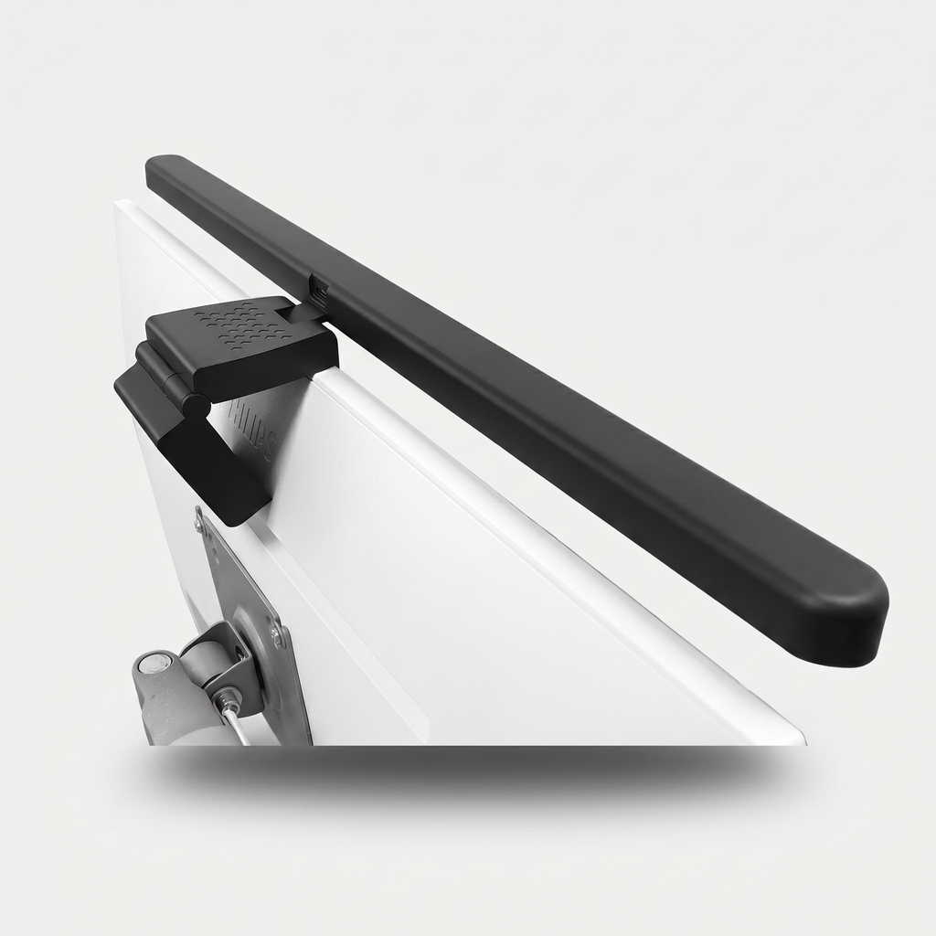 Black monitor light bar clipped to top of monitor