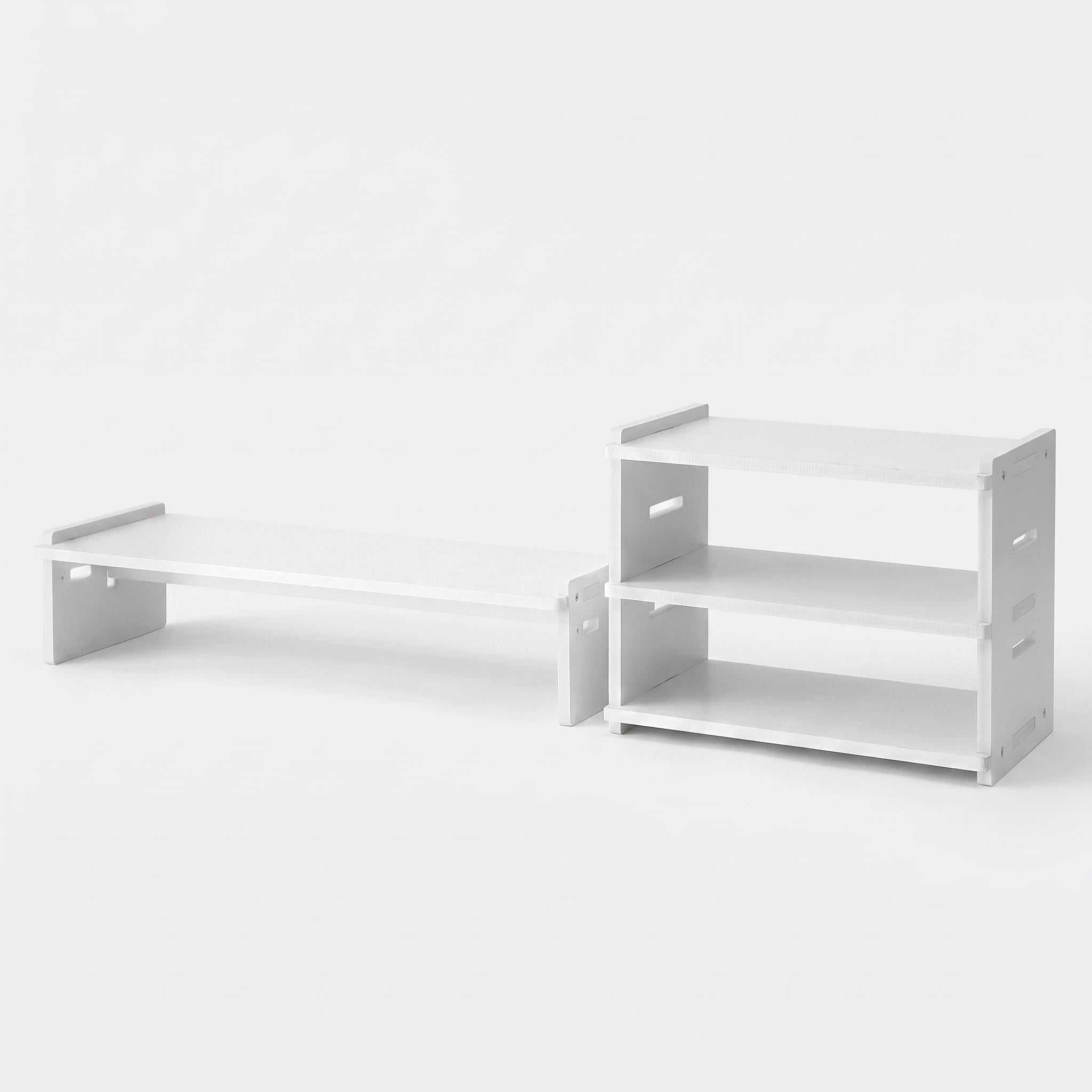 White monitor stand with 3-tier desk organiser holding office supplies
