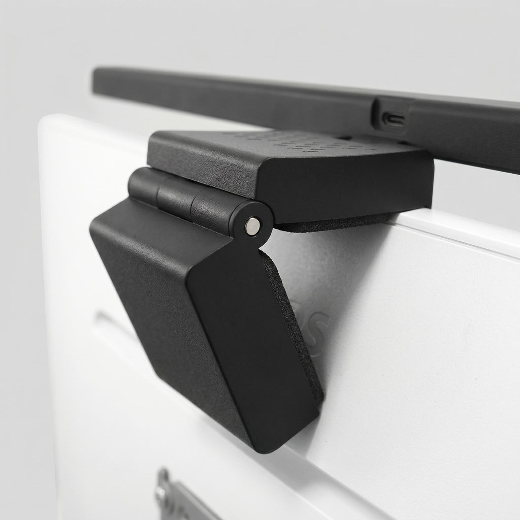 Close-up of monitor light bar touch controls and clip mount