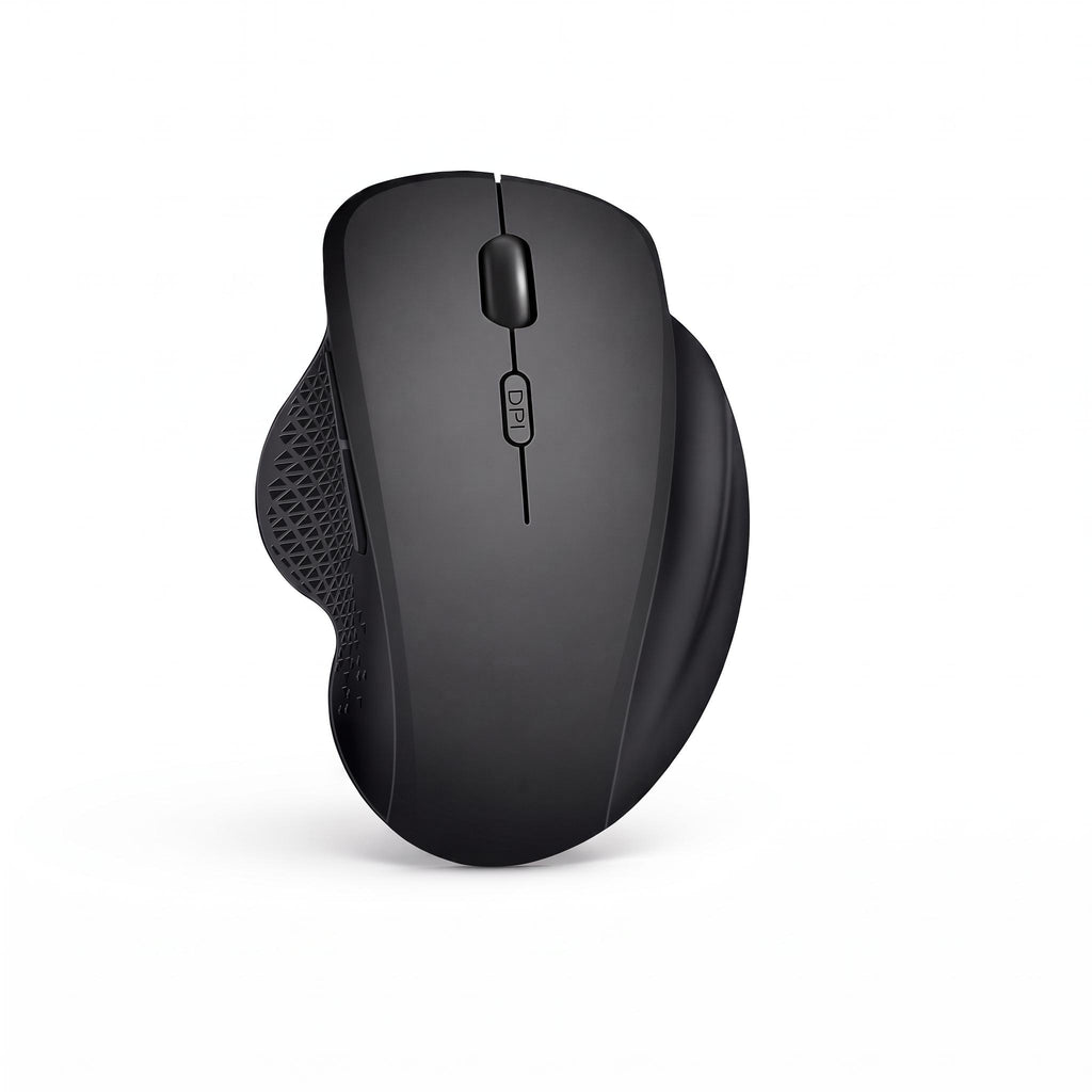 Black wireless mouse resting beside keyboard on desk mat